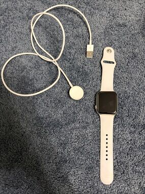 Apple White Smartwatch with White Sport Band and Charger